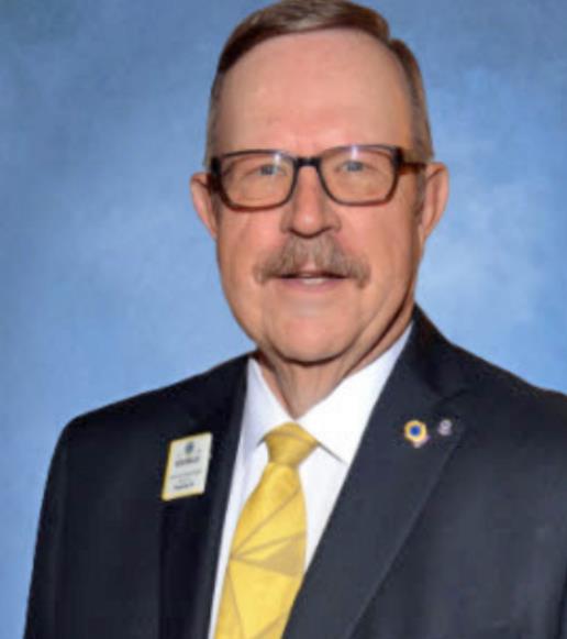 Lions Club District Governor Dr. Ron Miller of Plainview