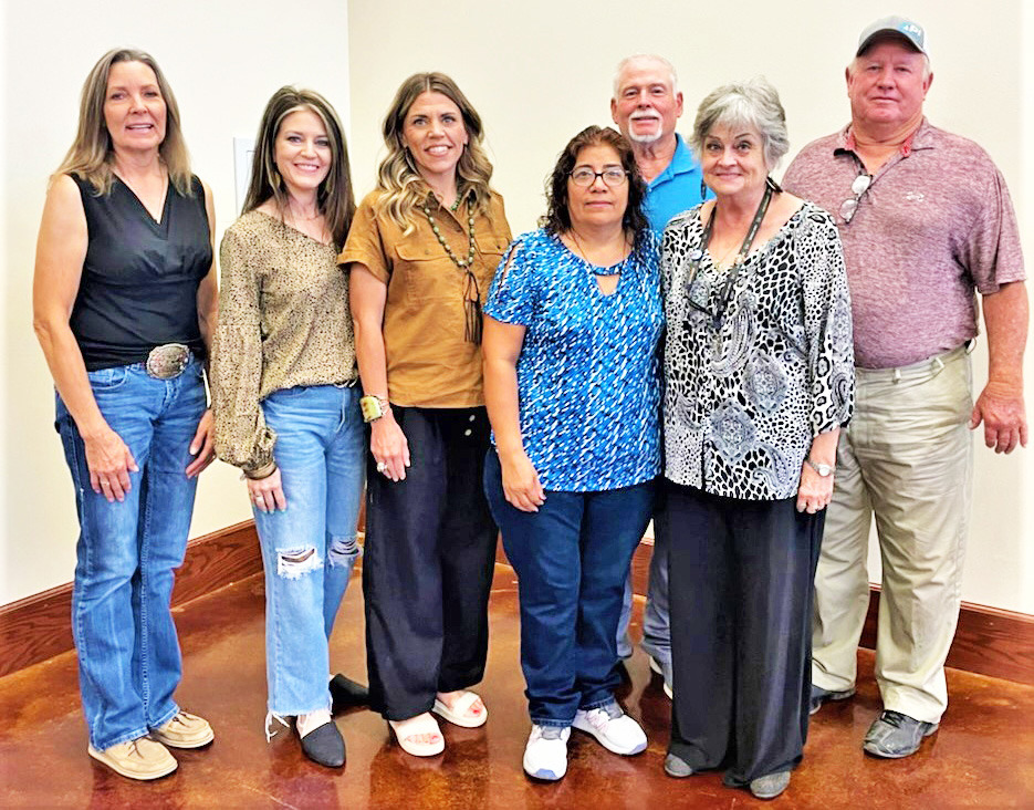 GUTHRIENEWSTAFF Guthrie Common School District welcomed new staff last week as a part of their in-service training. From left are Nancy Daniel, Tashya Carrillo, Melissa Everson, Maria Velasco-Ramierz, Jerry Arnold, Jill Edwards and Bobby Busby. | COURTESY PHOTO