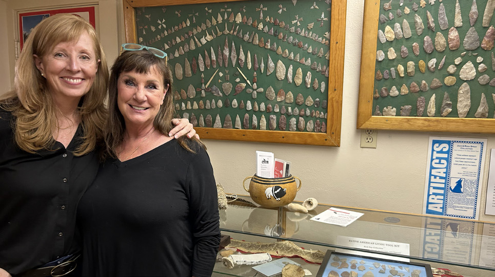 MARKER MAVENS Leesa Ruderman (left, with Rhonda Spray exploring the Jack and Rosa Spray family artifact collection at the Motley County Museum) encourages donations to offset the cost of a historical marker for the Whiteflat Cemetery. Call her at (301) 639-6369 if you can help. | COURTESY PHOTO