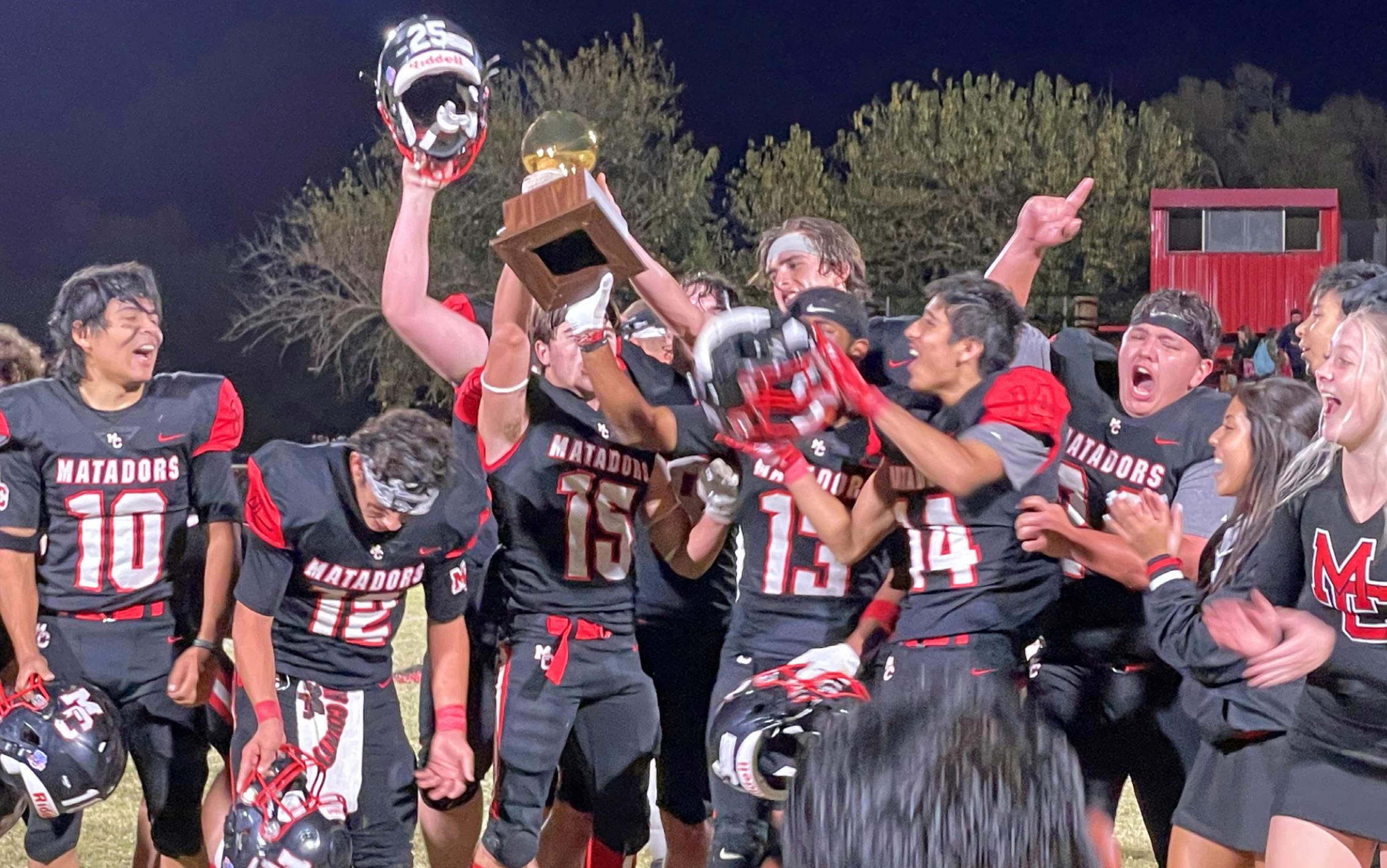 UNDEFEATED CHAMPS The Motley County Matadors defeated district 7-1A rival, the Jayton Jaybirds, 82-36 before their hometown crowd in Matador Friday night. The 10-0 record is the first time the team has had an undefeated season in Coach Mike Bigham's 16-year tenure. | CAPROCK COURIER