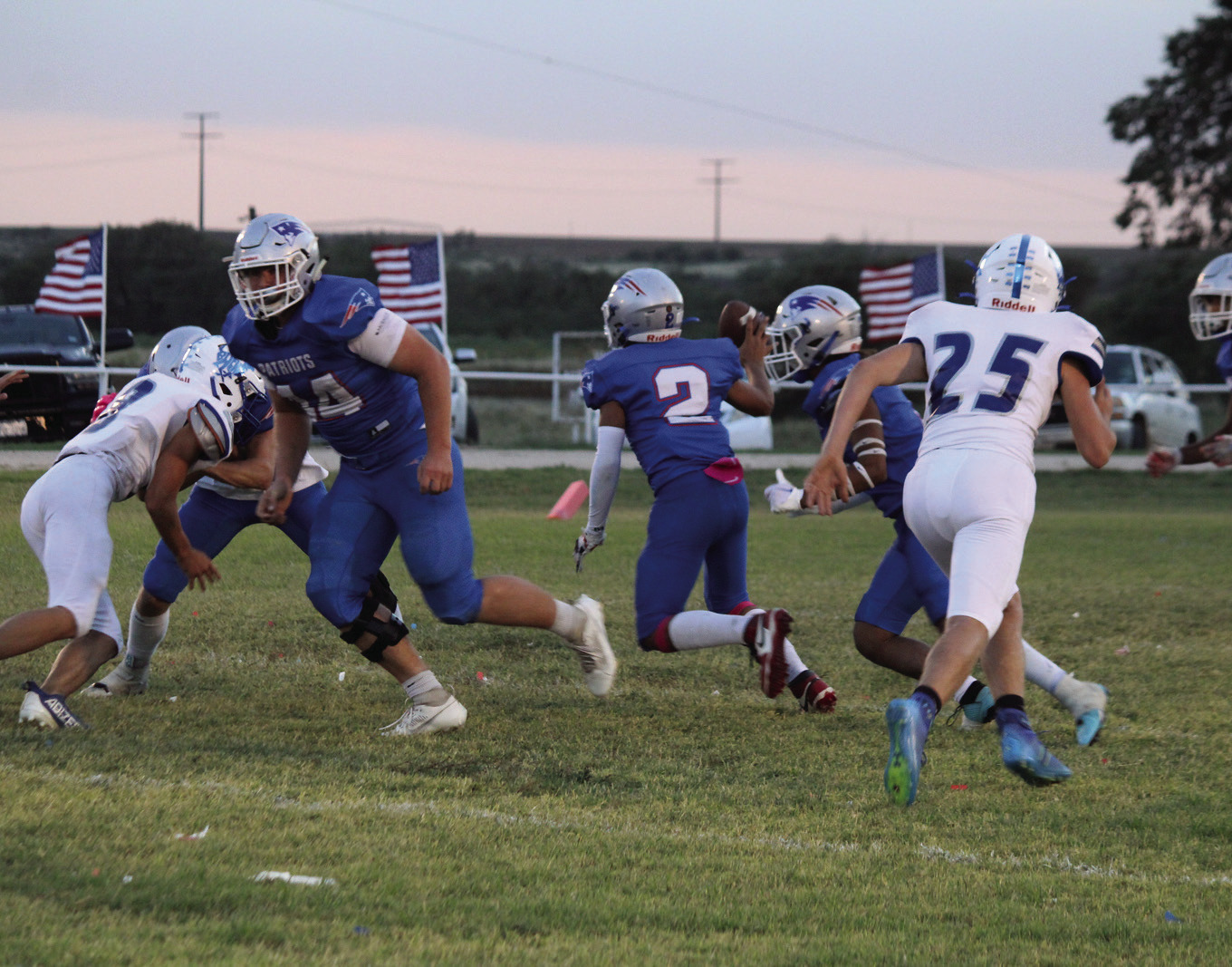 VALLEY VICTORY Freshman Damian Valdez #2 looks for a receiver while senior Tucker Schuelter #44 provides protection in Valley's 52-0 Homecoming win over White Deer. | COURTESY PHOTO