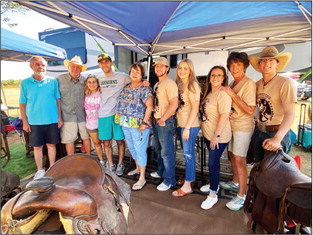 SCHWEITZER STORIES The Schweitzer crew that celebrated the 99th anniversary of H.H. Schweitzer’s saddle making at the 100th Anniversary of Dickens-Motley County Old Settlers Reunion &amp; Rodeo were, from left, Randy Moss, Mike Schweitzer, Marina Schweitzer, Reese Gregory, Sharon Schweitzer, Tanner Reynolds, Bentley Hunter, Reagan Barber, Marnel Moss and Tyler Reynolds. | COURTESY PHOTO