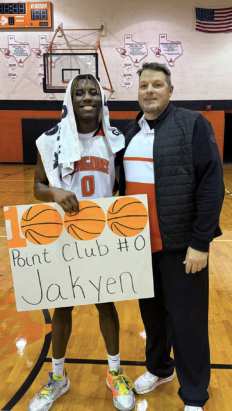 1,000 HONOR Jakyen Wright with the Paducah Dragons boys varsity basketball team exceeded the 1,000-point milestone last week in the Dragons’ 57-32 district win over Patton Springs. Coach Eric Rekieta (right) congratulates Wright on his accomplishment. | COURTESY PHOTO