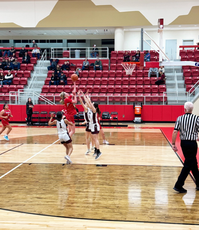MADDIE FRANCIS DRIVES THE LANE in Stinnett during the Bi-District playoff game against Texline Feb 10. | KODIE FAIRCHILD