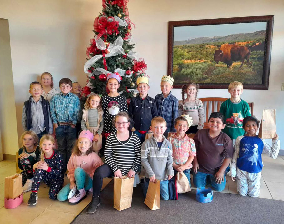 HOLIDAY ‘TRAVELS’ Valley youngsters had a chance to learn about Christmas celebrations in other countries at a Caprock Public Library event Dec. 11 that’s become an annual tradition. | COURTESY PHOTO