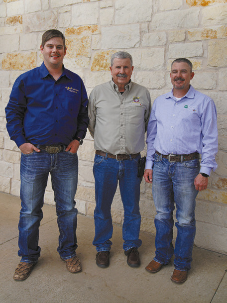 ATTHEIR BEST DannyNixon— with grandson Camden, left, and son Scott—remembers once telling a member who was stunned to see a crew out in a nasty storm, “Ma’am, when it’s the worst, that’s when we’re at our best.” | CAYTLYN CALHOUN, TEXAS ELECTRIC COOPERATIVES