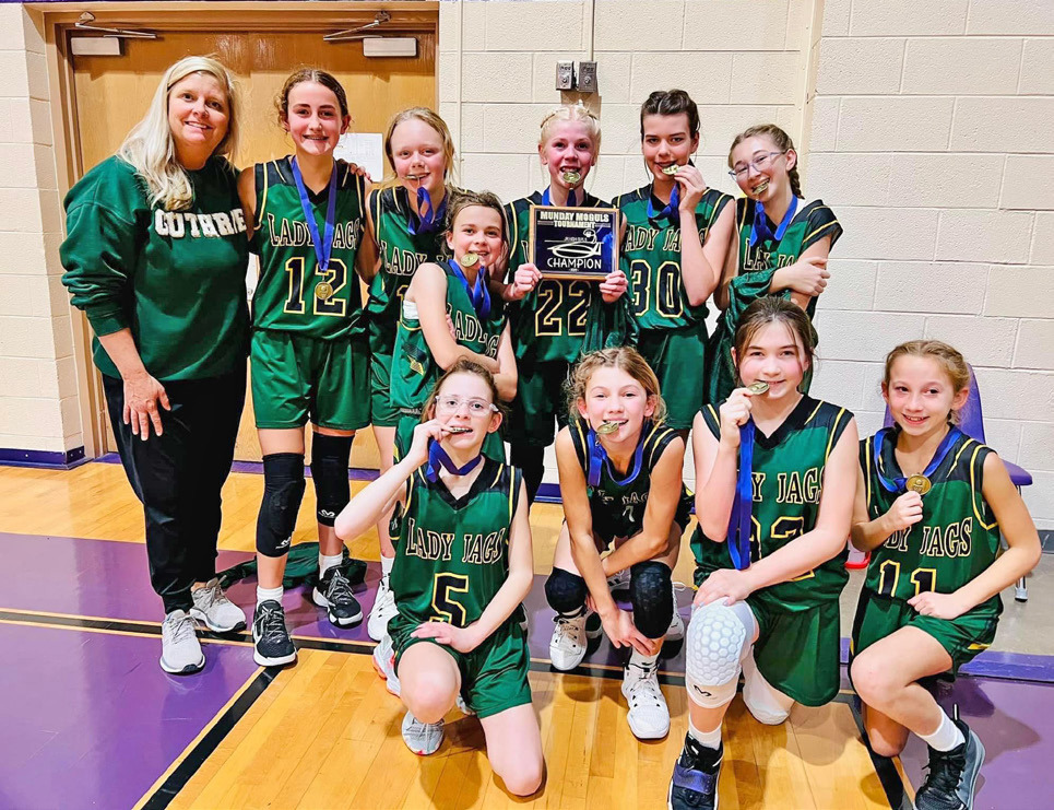 TOURNEY CHAMPS The Guthrie Junior High girls basketball team won the Munday tournament last week. | COURTESY PHOTO