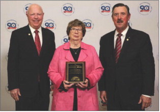 FARM BUREAU HONORS Dianne Washington (center) accepted the Texas Farm Bureau (TFB) District 2 Pioneer Award on Dec. 2 on behalf of the late Seab Washington of Motley County. The award was presented by TFB President Russell Boening (right) and TFB Secretary-Treasurer / District 2 State Director Walt Hagood. | COURTESY PHOTO