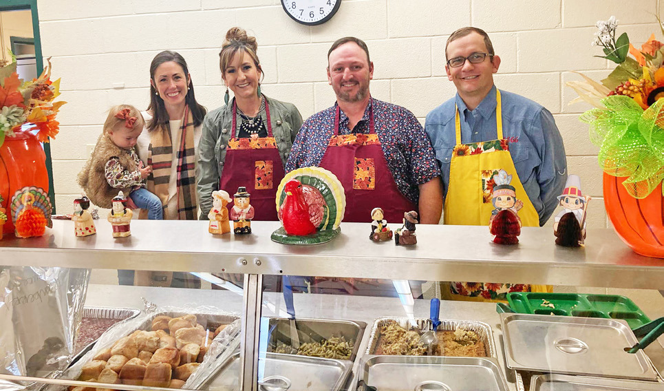 GCSD BOARD The Guthrie Common School District board of trustees helped students to get into the holidays by serving Thanksgiving lunch at school last week. | COURTESY PHOTO