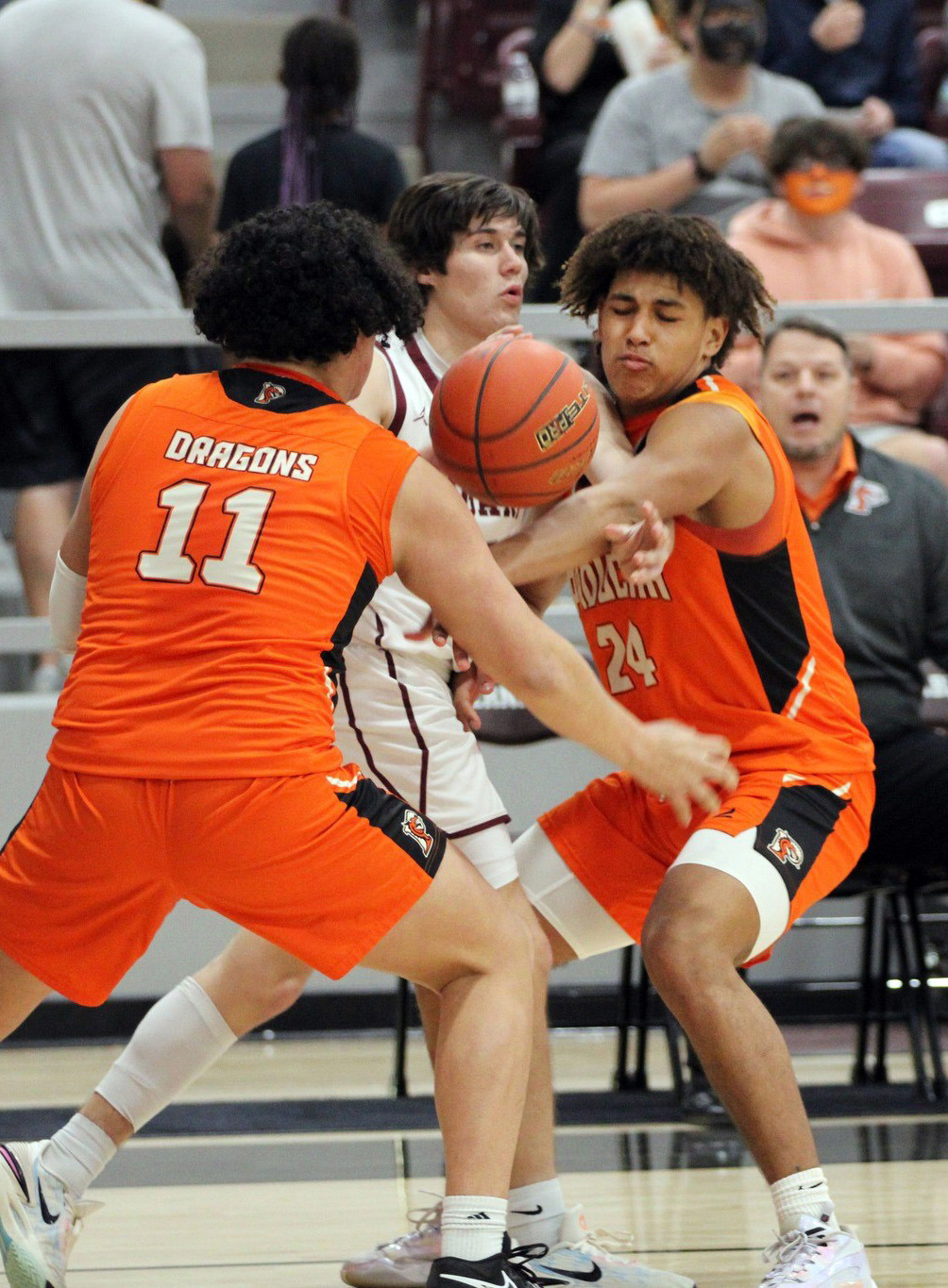 SEASON ENDS The Paducah Dragons boys varsity basketball team’s season came to a close Friday night as they fell to the Klondike Cougars 70-35 in Abernathy. | COURTESY PHOTOS