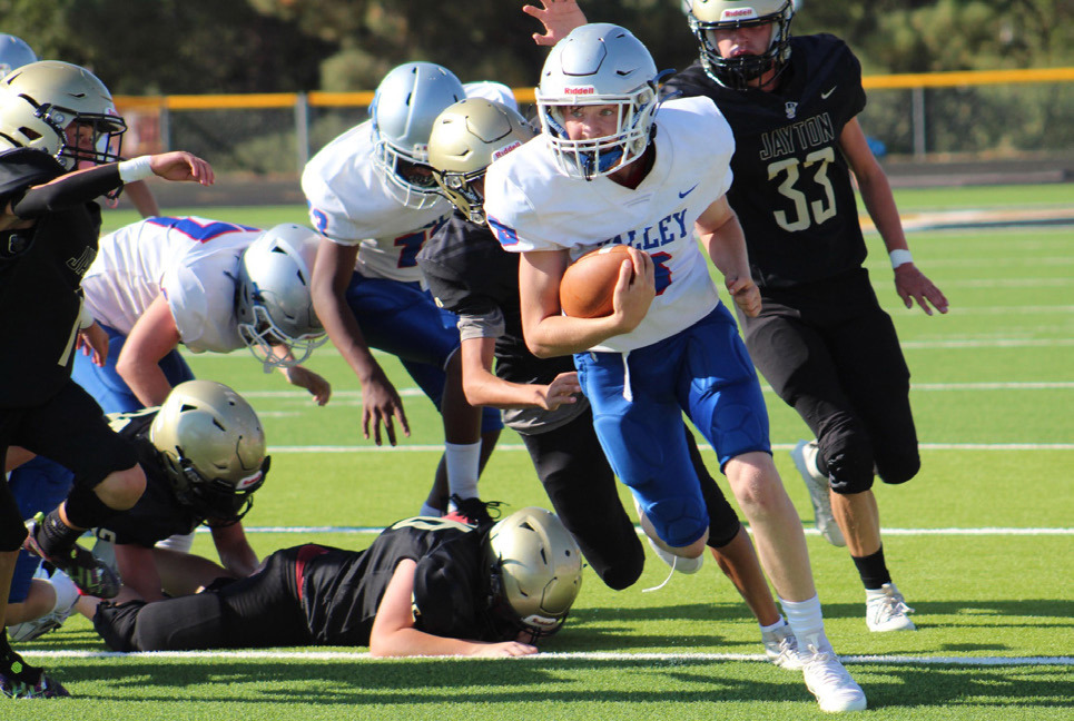 Valley Yearbook Staff member Desiree Reyes’ photo submission was picked byTexas 1A Fan for the weekly“Give UsYour Best ShotTop 10”photo contest. Reyes skillfully captured 8th-grader Cole Walden running the ball against Jayton in a JV matchup. | DESIREE REYES PHOTO