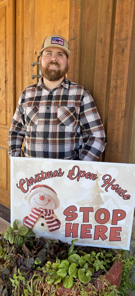 CHRISTMAS NIGHT OWL Rowdy Cogdell of Night Owl Espresso &amp; Tea joins other downtown merchants in welcoming residents and visitors to take part in Silverton’s citywide Christmas Open House Saturday, Dec. 3. MORE PHOTOS, PAGE 8 | COURTESY PHOTO