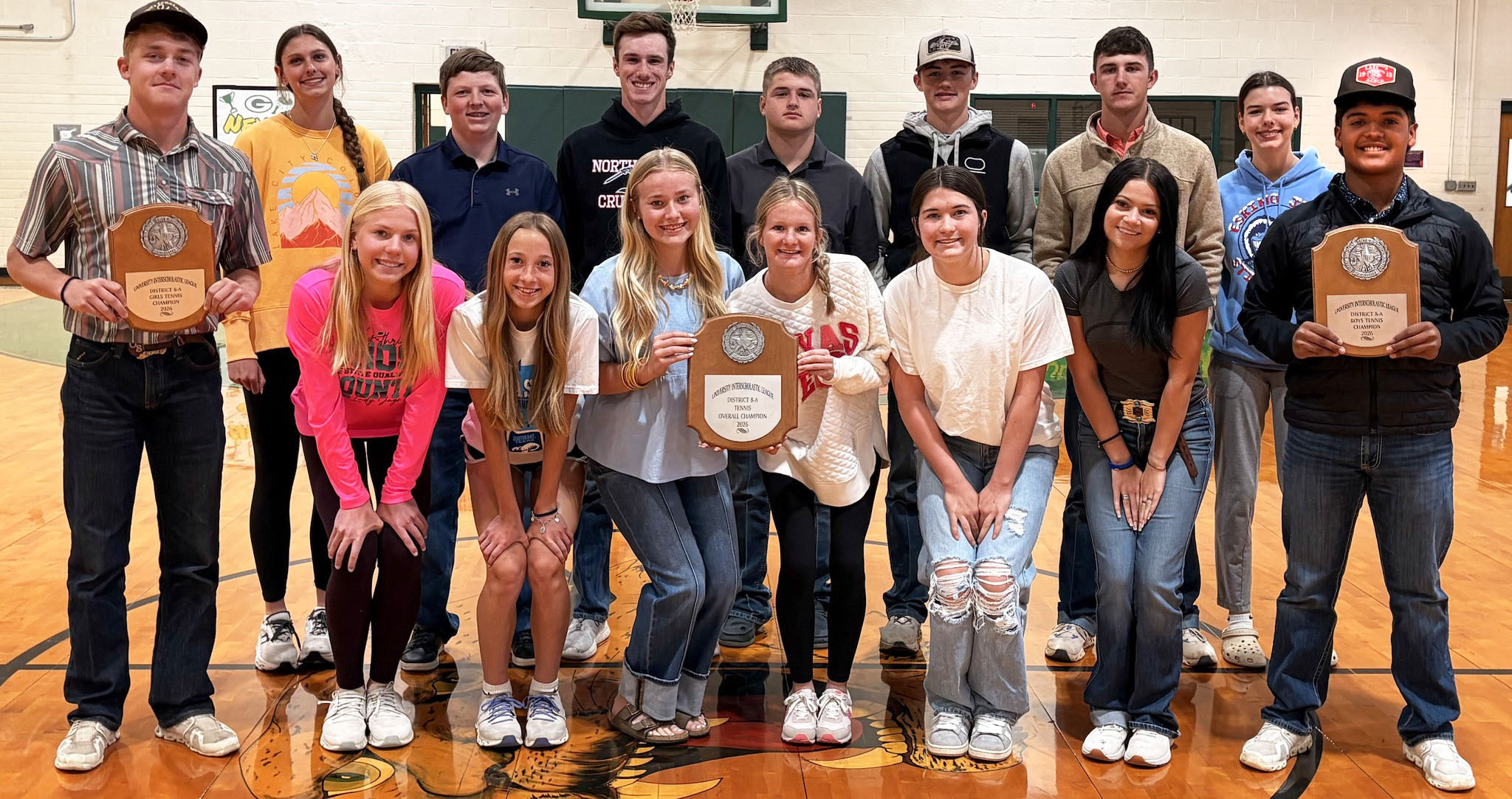 Guthrie sweeps district tennis
