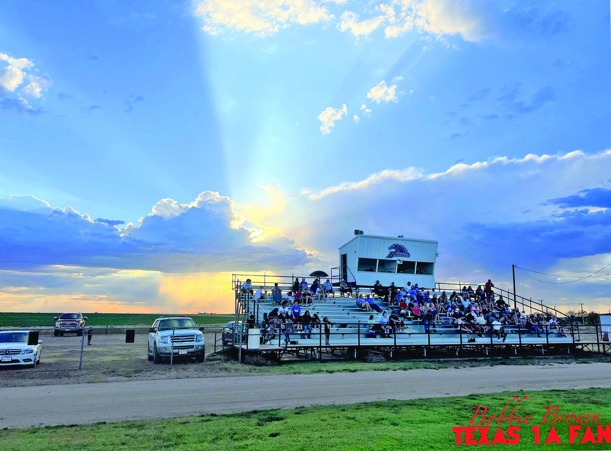 SUNSET ON SUMMER Despite the 105-degree weather, the sun is setting on summer. Last week, teachers went back to school, this week students return, and across Caprock Country football teams began scrimmaging against other opponents. Friday night the Valley Patriots were just one of the many 1A teams who traveled long, hot roads to begin the journey to another year of dreams for teams and towns. The Patriots faced the Meadow Broncos in a scrimmage. | TEXAS 1A FAN PHOTO