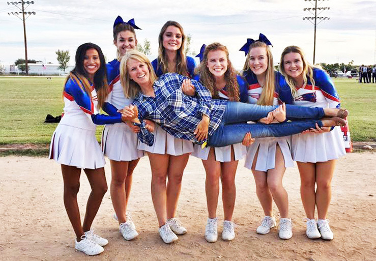 CHEERS!The legacy ofValley ISD’s longtime superintendent Jackie Jenkins is wrapped up in one pose—with the Patriots cheerleaders giving her a lift on the road to retirement. | COURTESY PHOTO