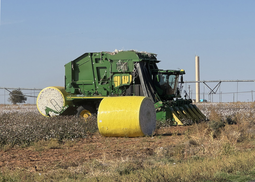 COTTON CROP across the Panhandle, South Plains and Rolling Plains is improved somewhat over past two years. Shown is harvest in progress last week at Rhineland, on the Rolling Plains in Knox County. | CAPROCK COURIER