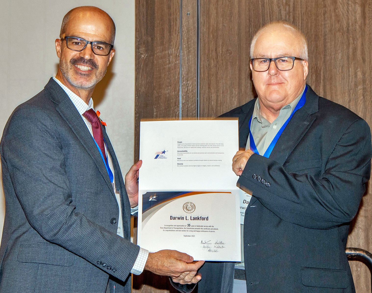DARWIN LANKFORD, district engineer for the Childress District (right) of the Texas Department of Transportation, received his 35-year service award during the 96th annual Transportation Short Course recently held in College Station. MarcWilliams,Texas Department of Transportation executive director, presented the award to Lankford, who has served as the D.E. for the Childress District since September 2021. | TxDOT PHOTO