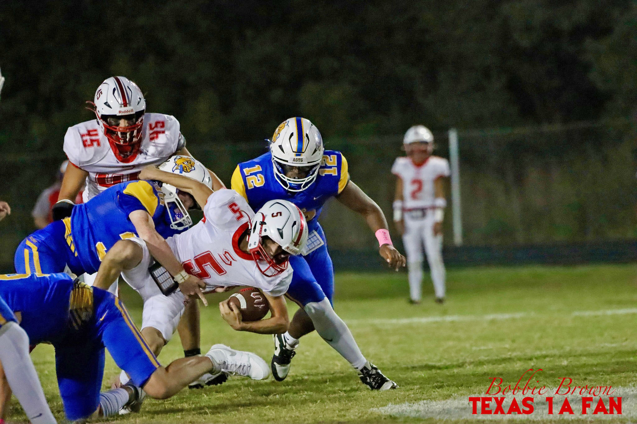 SLAYTON CAGLE POWERS THROUGH the Bulldog defensive line, looking for a first-down in the matchup against Spur on Friday, Oct. 10. | COURTESY PHOTO BY TEXAS 1A FAN