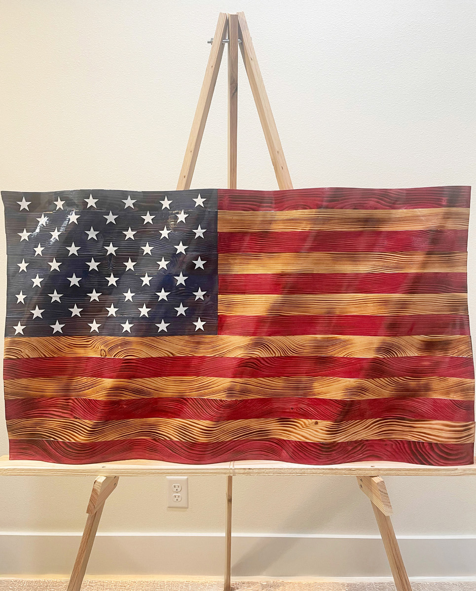 FLAG ART TO HIGHEST BIDDER Following the Memorial Day program in Roaring Springs May 26, there will be an auction of a beautiful, unique, handmade flag, with proceeds going to upkeep of the park. | COURTESY PHOTO