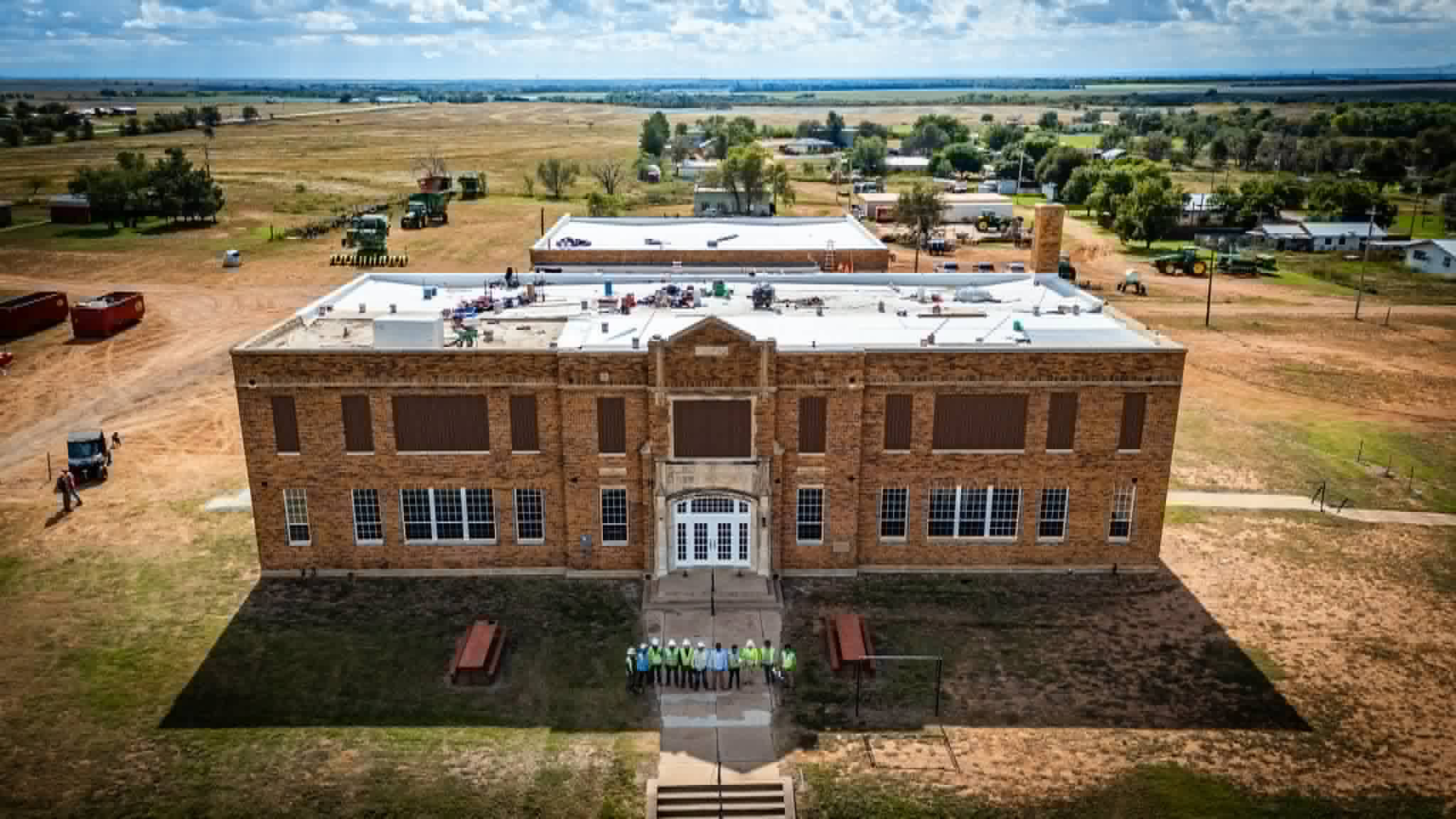 UP ON A ROOF Construction crews from Texas Roofing and Jason Milliken ensured that the Bob Wills Center got a badley needed new roof last year. | COURTESY PHOTO