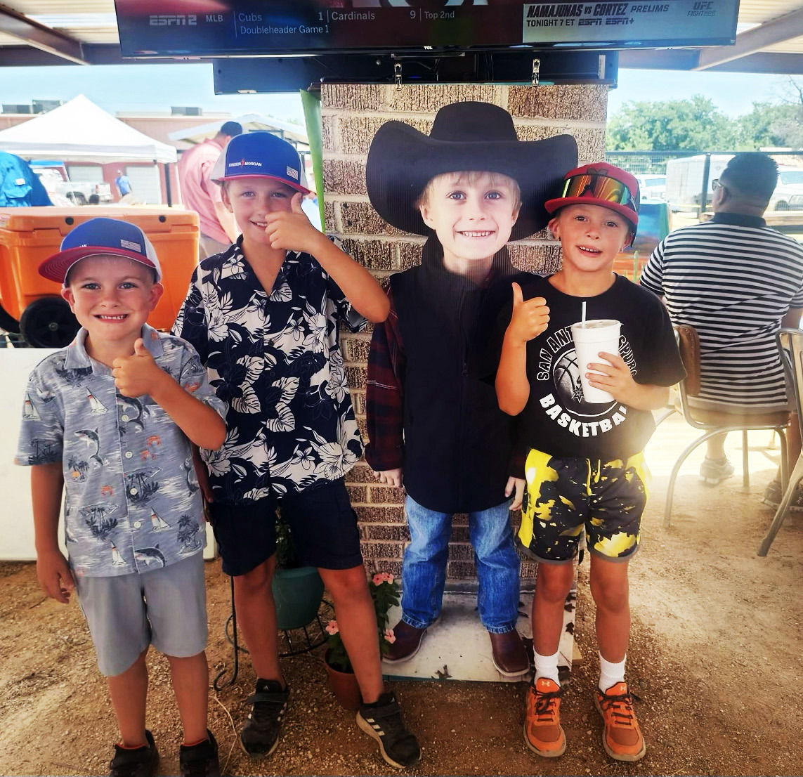 MATADOR GENEROSITY Volunteers donated the time and treasures in auctions, cornhole tournament, meals and music in a fundraiser July 13 for Paxton Barclay, who is being treated for a rare brain tumor. | COURTESY PHOTOS