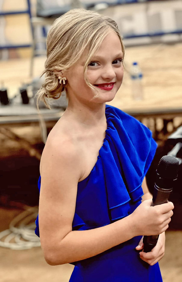 HOMETOWN TALENT At only 8, Laiken Brock, daughter of Taylor and Marissa Brock of Silverton, hopes to be selected to sing the national anthem at this year’s National Finals Rodeo in Las Vegas. | KODIE FAIRCHILD