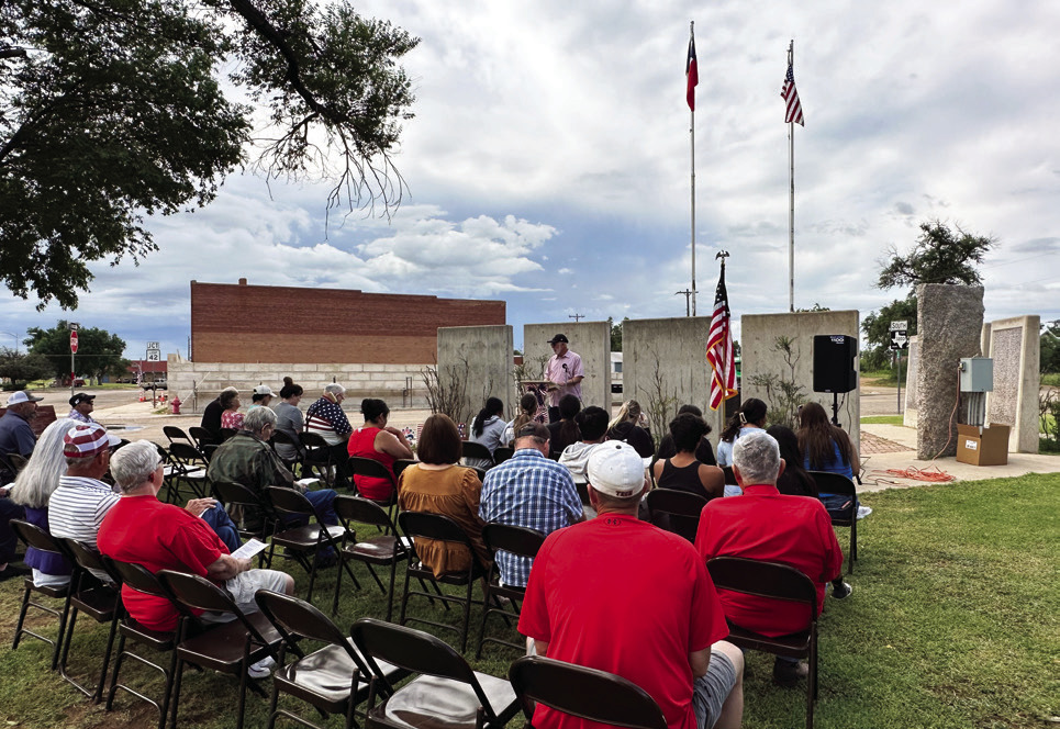 REMEMBRANCE OF LONG AGO—AND LAST WEEK In Roaring Springs July 1, neighbors gathered at the community’s memorial to share thanks for those who fought for the nation’s freedom. Bob Kilmer also remembered Motley County’s recent tornado victims and voiced appreciation for volunteers who came together to support Matador, even including strangers who had no ties to the town. MORE PHOTOS, PAGE 10 | ELLA JENKINS