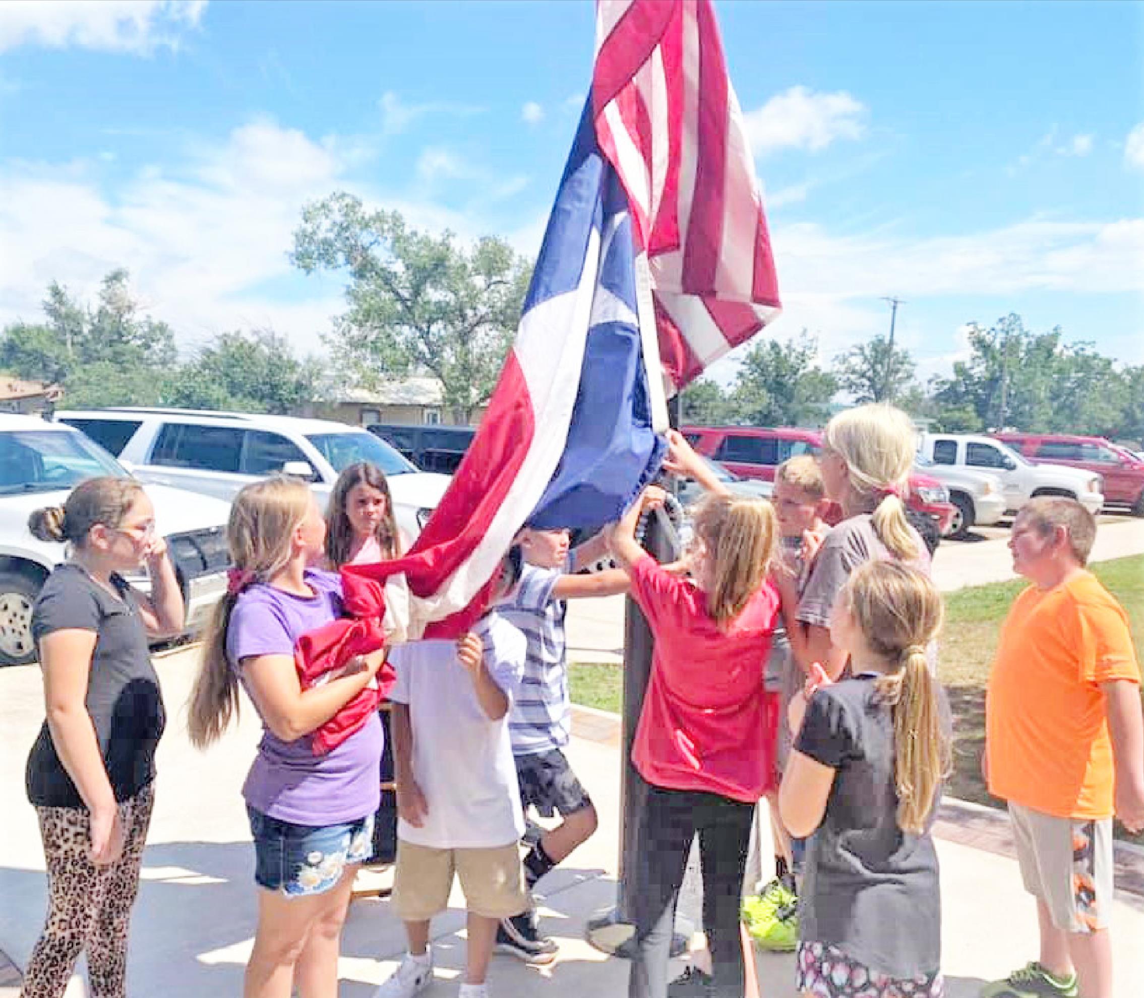 RAISING THE FLAGS