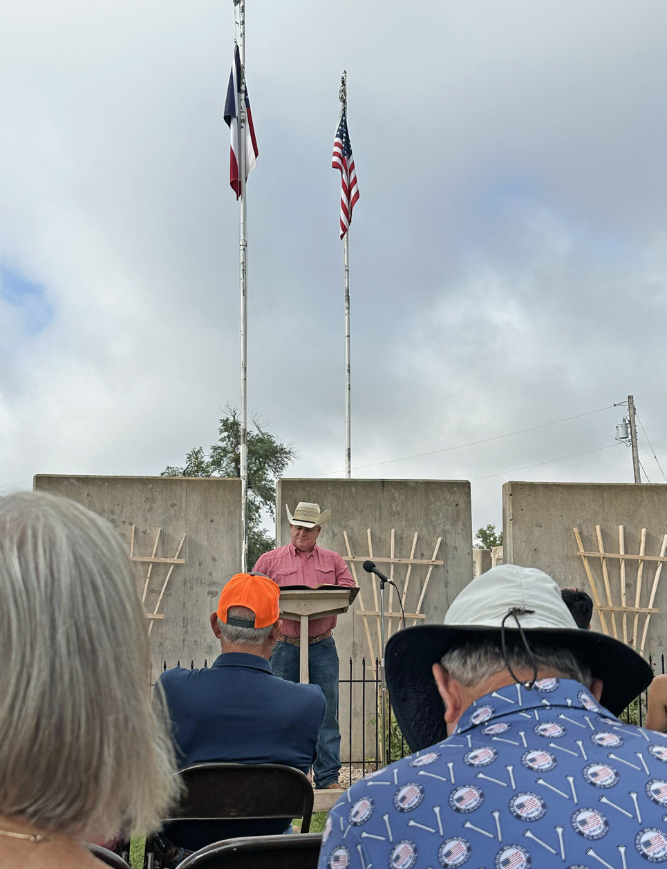 PATRIOTIC PRIDE Though attendance may have been slight at the Roaring Springs memorial last Friday morning, patriotic sentiment—led by veteran and Motley County Sheriff Robert Fisk—ran high. | TINA BROOKS PHOTO