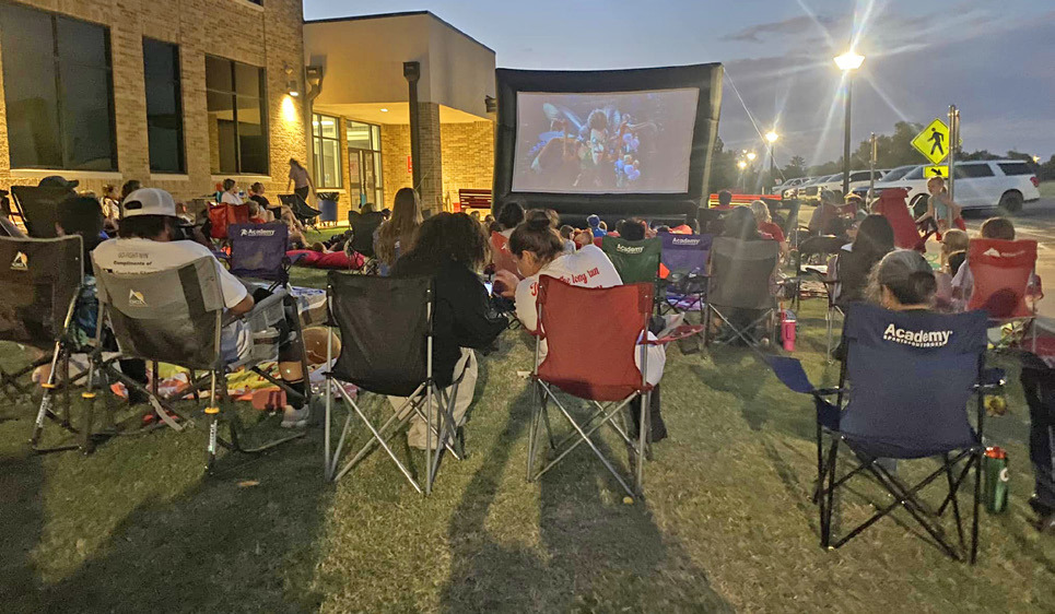 Silverton’s Parent Teacher Organization (PTO) presented their first movie night, showing “Despicable Me 4” on the front lawn of the school, complete with a concession stand, and attendees brought blankets on comfy chairs on Friday, Sept. 13. | COURTESY PHOTO