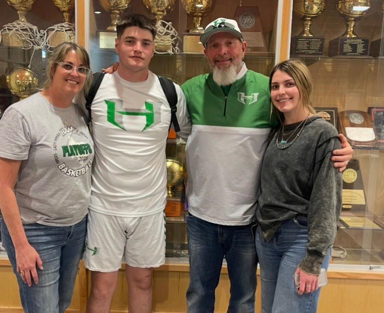 NEW VALLEY COACH Valley has hired Casey Botos, shown here with her husband Hamlin head coach Jason Botos and her family, as the new head girls basketball coach. Amy Bowles, the previous Valley basketball coach, accepted a position at Rankin. | COURTESY PHOTO