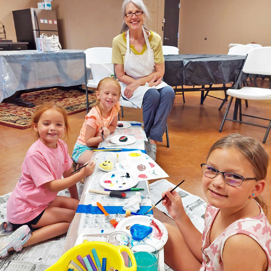 SILVERTON SUMMER READING Blaire Beedy, Jewel Cogdell, and Grace Estes were just a few of the many youngsters who painted kindness rocks, hosted by Kathy May at the Silverton Library. | COURTESY PHOTO