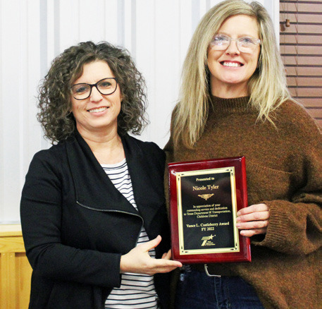 END-OF-YEAR AWARDS Childress District traffic safety specialist Nicole Tyler, right, was the 2022 recipient of the Vance L. “Huck” Castleberry award presented on Thursday, December 1. Presenting the award was Childress District Business Operations Manager Anita Thompson.