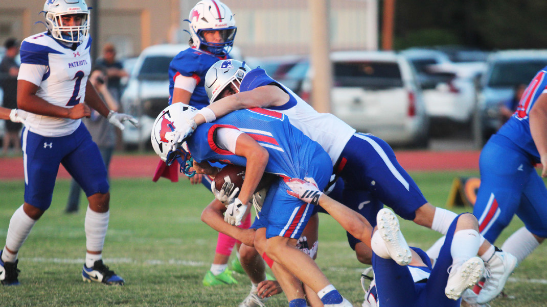 CARSONTUCKER DOWNS A MUSTANG in the game at Claude on Friday, Oct. 3. | COURTESY PHOTO BY VALLEY YEARBOOK