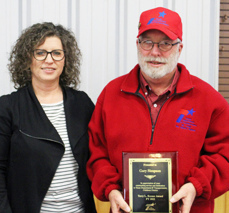 TOP TECH Motley County sign technician Gary Simpson, right, was the 2022 recipient of the Terry L. Keener award presented on Thursday, December 1. Presenting the award was Childress District Business Operations Manager Anita Thompson.
