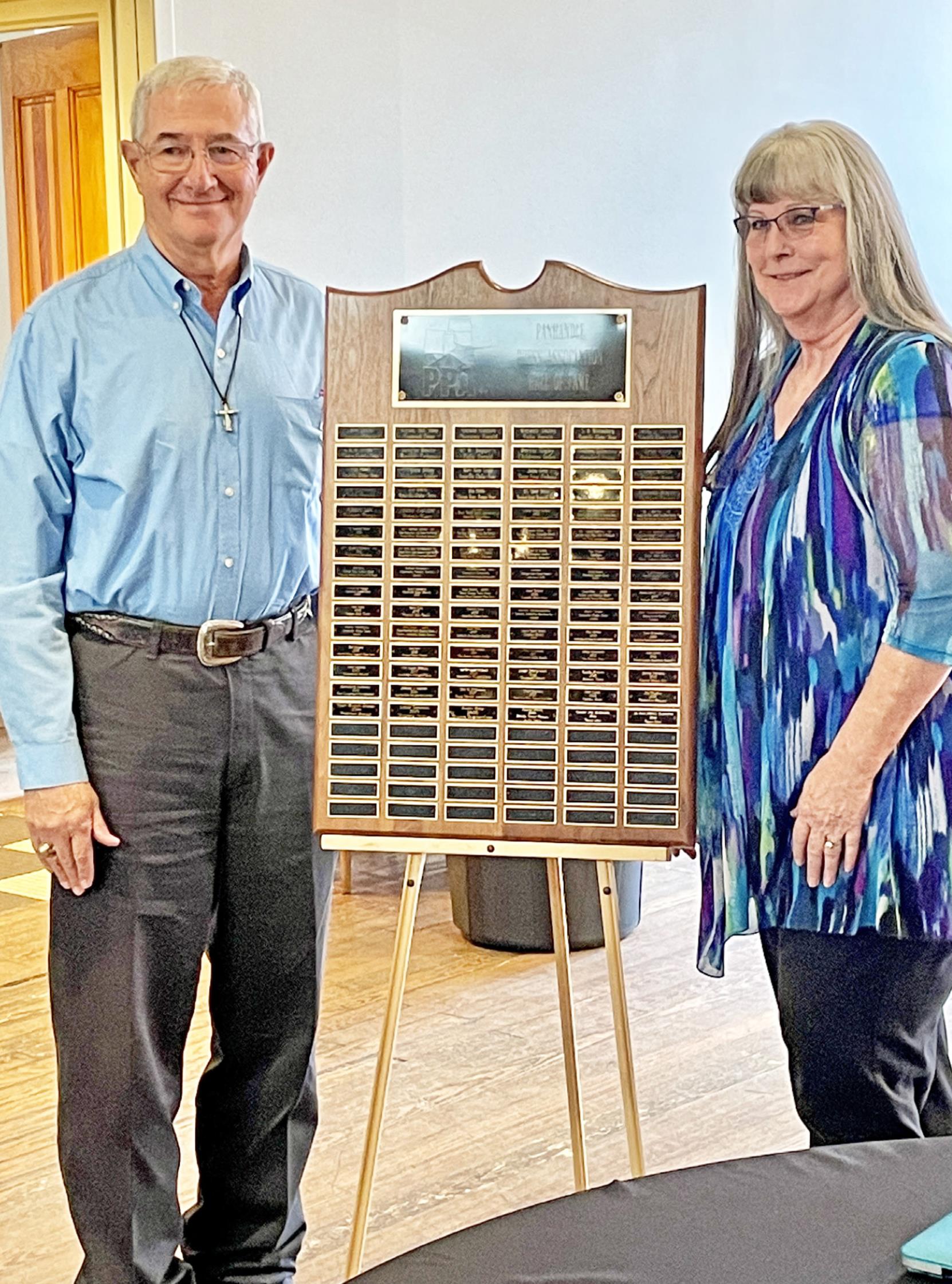 REGIONAL JOURNALISM HONORS The late Joe and Jo Ann Harrison, owners and publishers of The Texas Spur newspaper from 1958 to 1996, were indicuted Saturday into the Panhandle Press Association Hall of Fame. Son Chuck Harrison (left) and his wife, Nancy of Matador, accepted the honor. | CAPROCK COURIER
