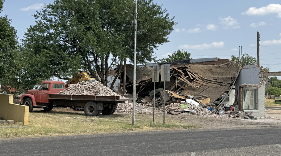 DEMOLITION on the old gas station at Main and Bailey is continuing: above left, in November 2023; right, last week. | CAPROCK COURIER PHOTOS