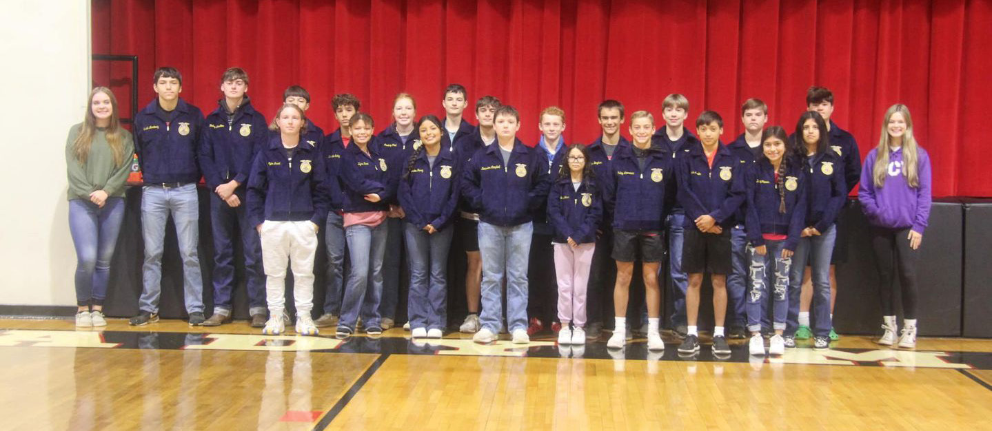 Motley County FFA members were presented their blue and gold corduroy FFA jackets Tuesday morning by adviser Jim Cooper, Coach Mike Bigham, Chapter President Harlee Hill, and District officer Brooklyn Freeman. | COURTESY PHOTO