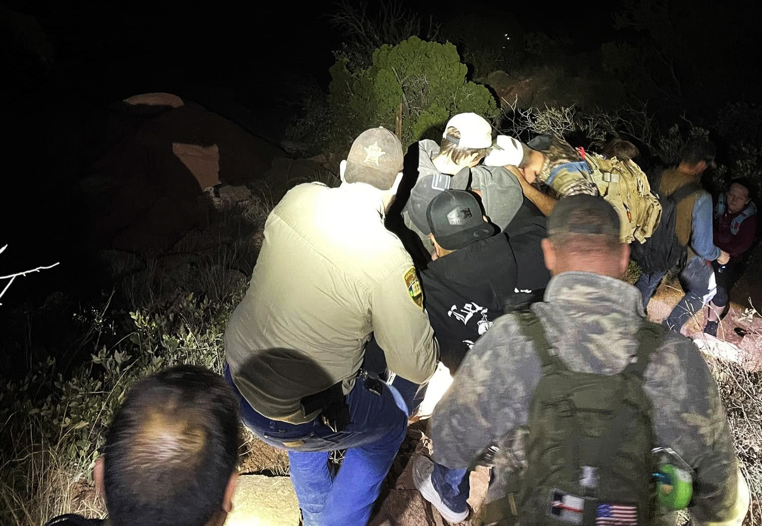 CRT ASSISTS WEAKENED HIKER off the treacherous Hayne’s Ridge late on Dec. 8. | COURTESY PHOTO
