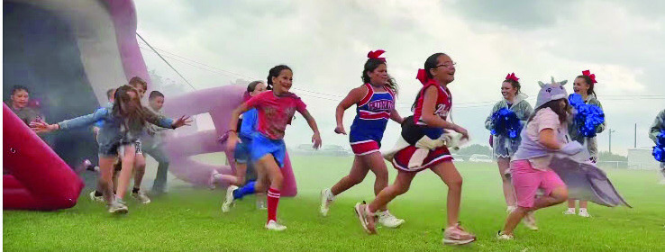 NEW TRADITION AT VALLEY Tradition is alive at Valley School as they formed their first ever Patriot Platoon on Friday, Sept. 5. The platoon, made up of elementary students, will be ready to run through the helmet with the Patriots at every home game this year. | COURTESY PHOTO