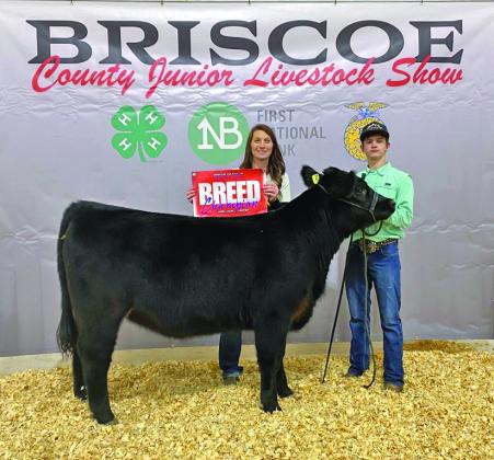 Valley'sTripp Carlisle along with his mother Shanlee show off one of his award-winning heifers at last weekend's Briscoe County Stock Show. See next week's Caprock Courier for the Winners' Circle of all area stock shows. | SHADI BUCHANAN PHOTO