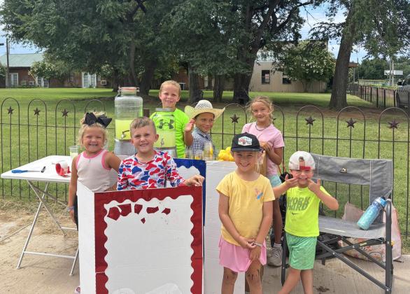 ‘WE WANT A NEW PARK!’ Turkey kiddos turned out Friday, June 27 to do their part in raising funds for their new city park. | COURTESY PHOTO