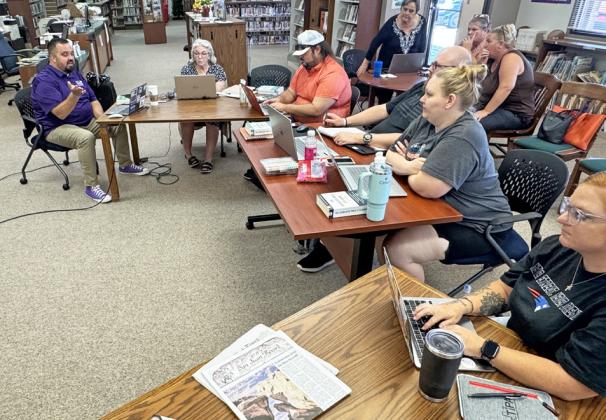 NEWSPAPER TEAM From left, journalists participating in last week's workshop were Russ Morris, The Post Dispatch; Kodie Fairchild, The Caprock Courier; Anna Gibson, Paul Gibson, The Post Dispatch; Barbara Brannon, Kay Ellington, The Texas Spur; TCCJ Director Austin Lewter; and Sue Jane Sullivan, columnist and calendar editor for multiple newspapers. | LIZ ADAMS PHOTO
