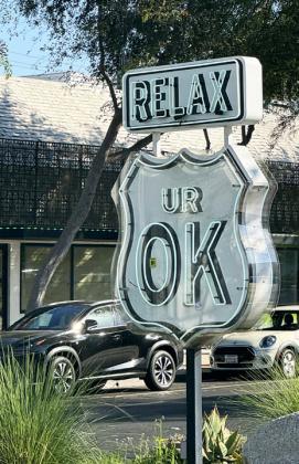 From Hollywood's Sunset Boulevard to Santa Monica, familiar icons abound. At the End of the Trail on the Santa Monica Pier, merchant and artist Ian Bowen presented us our Route 66 Certificates of Completion.