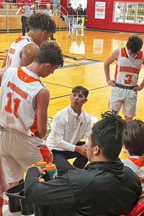 TIMMONS TIME OUT Paducah head coach Casey Timmons called a time out with Dragons Caler Timmons, Darren Mackey, Cyler Timmons at the Aspermont Tournament last weekend. | CAPROCK COURIER