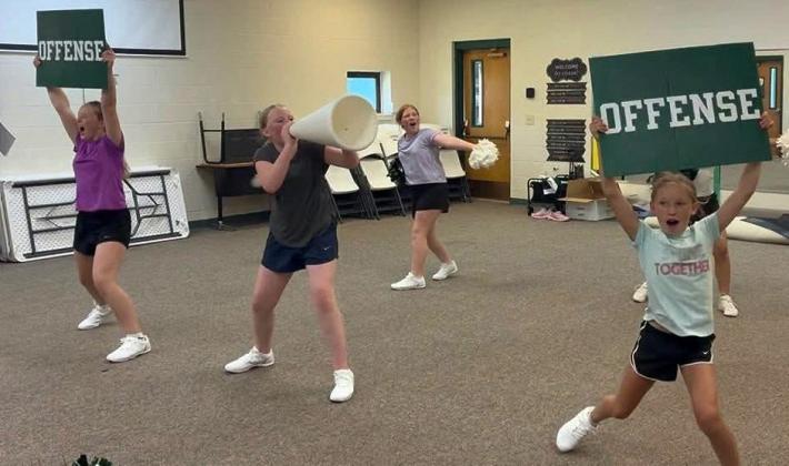 GUTHRIE CHEER Guthriejunior high cheerleaders attended cheer camp last week to get ready for a new sports season this fall. | COURTESY PHOTOS
