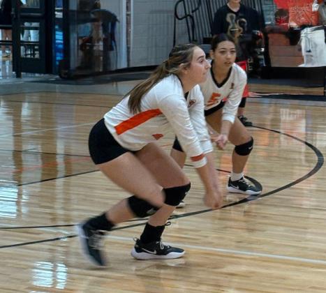 Junior Cami Canales gets a dig while teammate Ana Murguia provides cover during the Lady Dragons match against Rotan. | SUE JANE SULLIVAN
