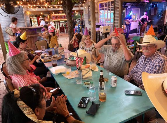 THE BACK PORCH at Hotel Turkey is an ideal locale for a birthday celebration amid the musical delights of the hotel’s third annual Songwriter Festival.