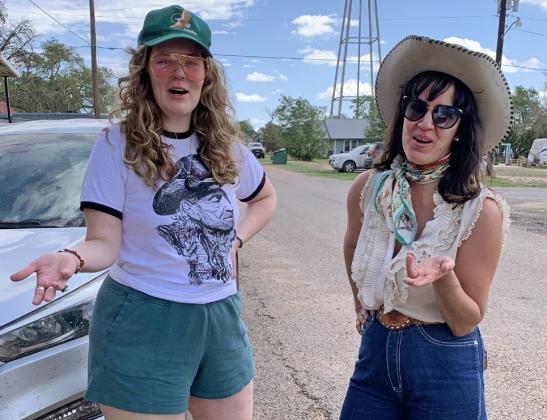 WHERE FRIENDS MEET Turkey Songwriter Festival participant Mallory Eagle (wearing Willie on her shirt) visits Saturday in Turkey with Ginny Mac, who was headed home to FortWorth after vocal-accordion-keyboard gigs in the Texas Panhandle. Other performers and spectators interacted throughout the 3-day event.