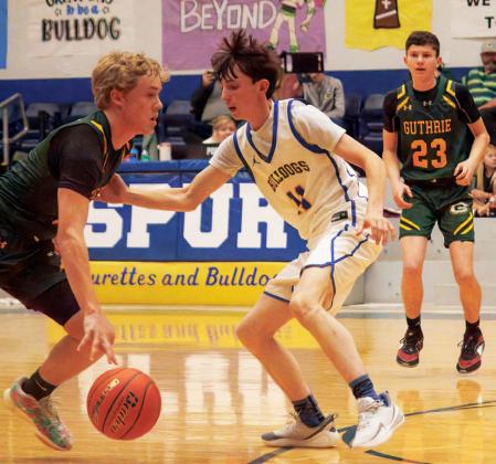 JAGS FALL The Guthrie Jaguars varsity boys basketball team took a couple of tough losses last week, falling to the Spur Bulldogs 49-- 39 and the Valley Patriots 71-34. | COURTEY PHOTO